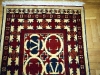 Ok un cazzo  red and white (particolare),  lana annodata a mano su ordito di cotone,  cm.90x140,  2000