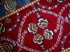 Mukunni red version ( particolare),  lana annodata a mano su ordito di cotone,  cm.150x200,  2000